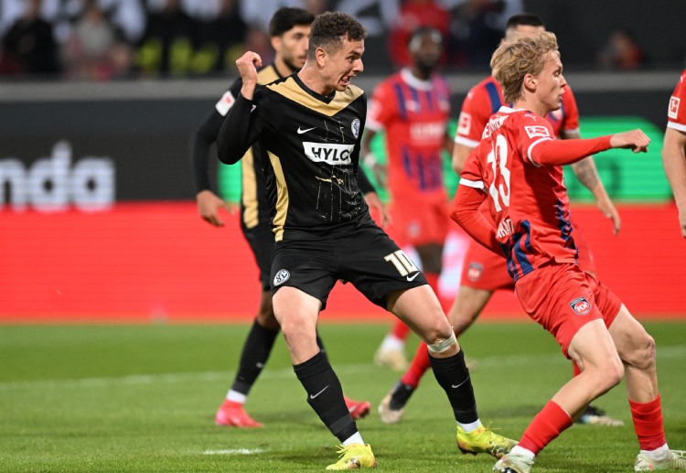 Fisnick Asslani in action for Elversberg during the Bundesliga relegation match against Heidenheim